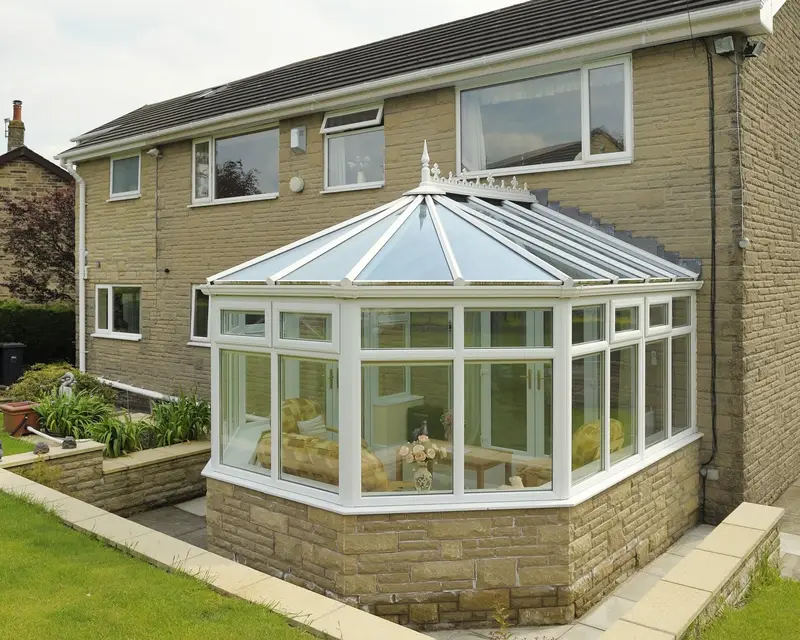 Victorian glass roof conservatory on a stone house