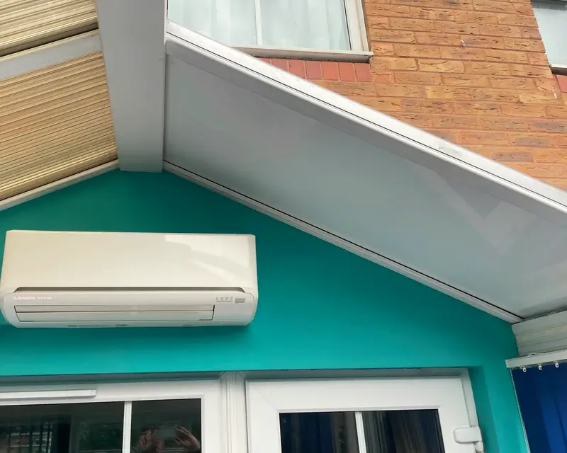 New insulated panels meeting old polycarbonate halfway through fitting
